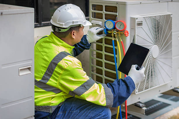Professional Hvac technician working in Hardin, MT